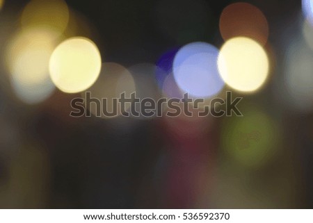 Colorful abstract blurry background  and bokeh of Christmas lights glow on street night