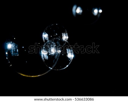 soap bubbles on black background, Photo of soap bubble, blurred bubbles image,
