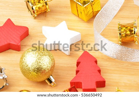 Christmas tree and decor on natural wooden background