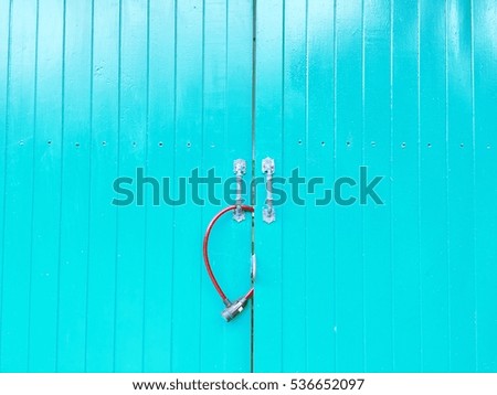 blue door with chain lock