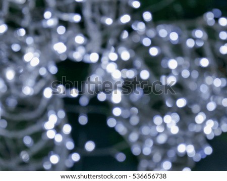 White or silver glitter bokeh background.
Abstract white Bokeh circles for Christmas background.