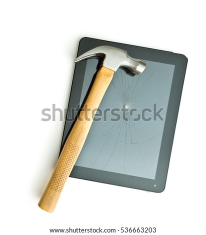 Tablet screen broken with a hammer. Isolated on white background.