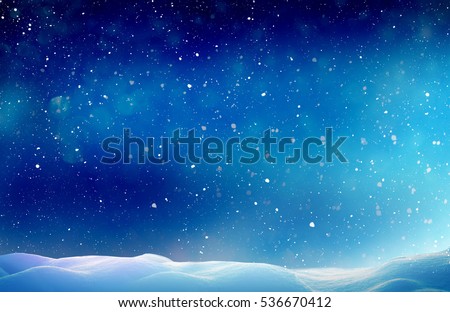Christmas winter background with snow and blurred bokeh.Merry Christmas and happy New Year greeting card with copy-space.
