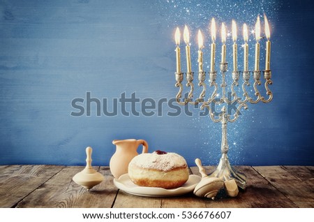 Image of jewish holiday Hanukkah with menorah (traditional Candelabra)