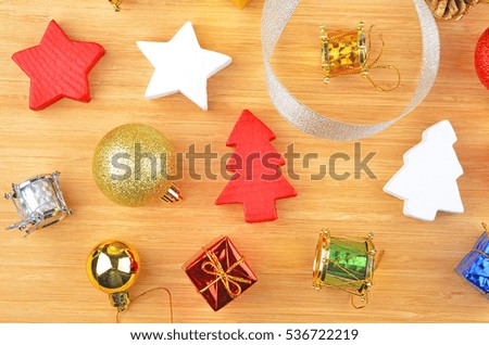 Christmas tree and decor on natural wooden background
