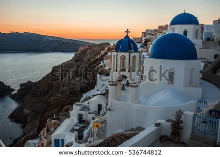 Image of Blue dome of white church in Oia, Santorini, Greece