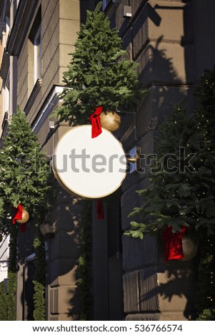 Signboard with Christmas decorations. Mock up. Round shape