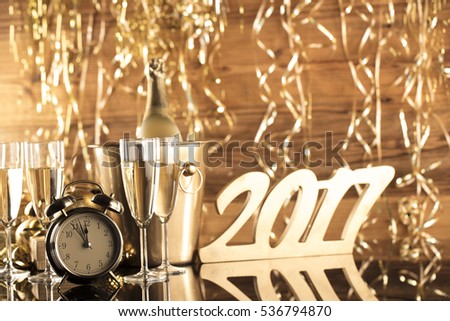 Golden New Years Eve celebration background. Place for typography Royalty-Free Stock Photo #536794870