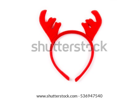 Funny Christmas antlers of a deer. Colorful reindeer antlers headband. Isolated on white background. Closeup.