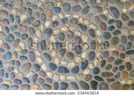 Image of concrete with brown gravel texture