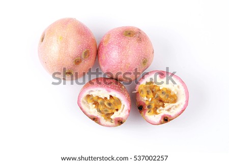 Passion fruit over white background