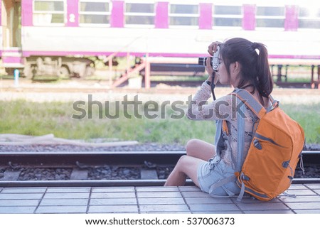 Young tourists take the train