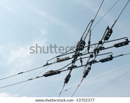  tramway network wire crossing on sky background