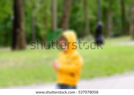 Happy family on a walk theme creative abstract blur background with bokeh effect