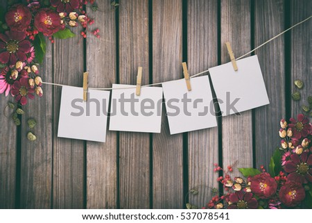 Wooden background and red flowers, words on paper sticker Royalty-Free Stock Photo #537078541