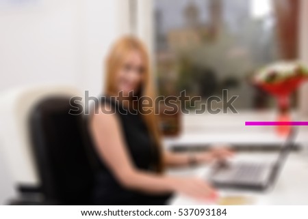 Blond office woman theme creative abstract blur background with bokeh effect