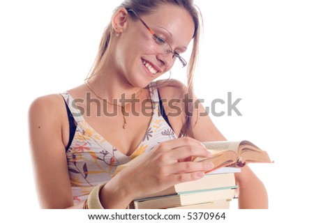 Young student girl with books on white backgrounds
