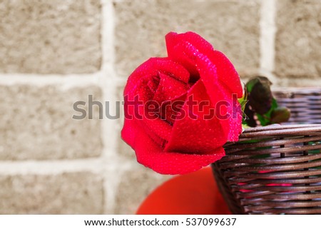 abstract picture red rose on the wooden basket on sepia color background,  greeting cards, happiness festival, New years wishes, Valentine days.