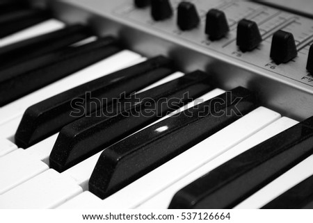 Close up MIDI Controller, keys  and feders