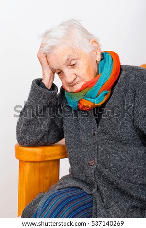 Picture of a depressed old lady being lonely