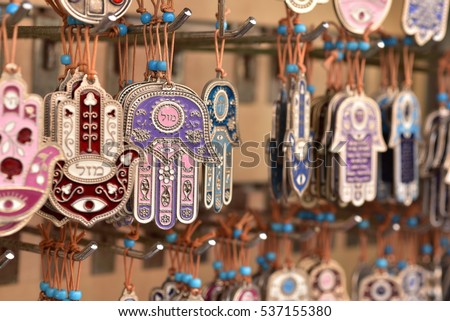 Hamsa is a palm-shaped amulet popular throughout the Middle East and North Africa, and commonly used in jewelry and wall hangings