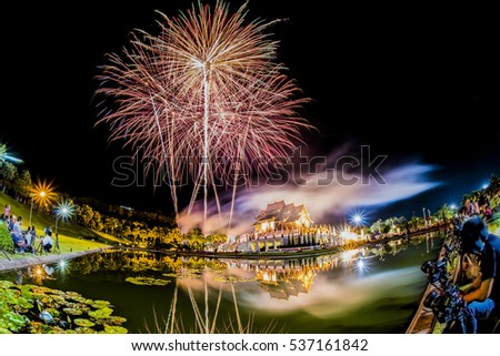 Photographers taking photos of fireworks at Royal Park Rajapruek Chiang Mai Thailand