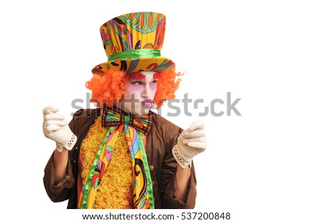 A frustrated and resentful clown, isolated on white background