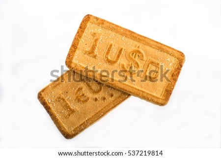 Dollar and euro currency symbols on the cookies isolated on white background with work path.