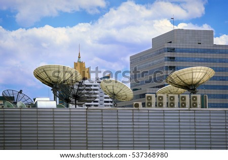 Satellite dish on top of the building.