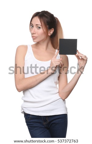 Woman holding blank black sign. Close up. White background