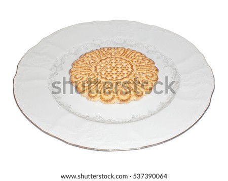 Cookies on a plate isolated on a white background.