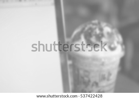 Blurred abstract background of ice cocoa with monitor laptop