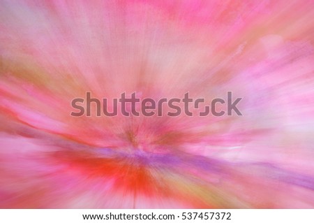 blurred multicolored pastel background with a smooth transition of colors from pink to purple