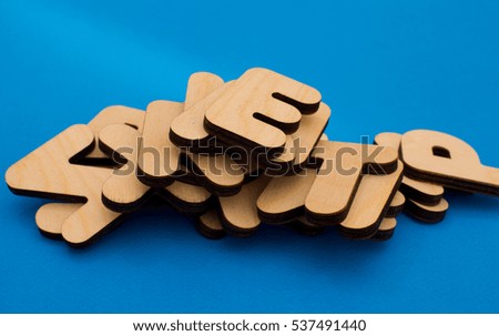 Wooden alphabet. Wooden letters. Wooden alphabet blocks with letters