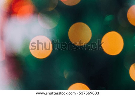 Glow of Christmas colors. Defocused background with lights bokeh