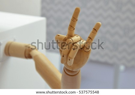 Portrait of the feeling i love you figure symbolic with wooden finger and arm model
