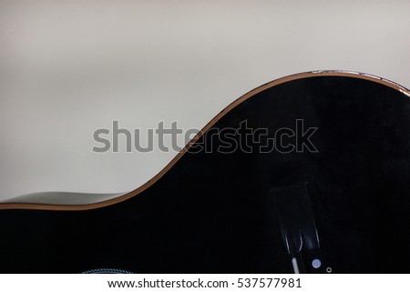 Black acoustic guitar body 