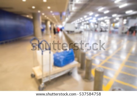 blur picture background of supermarket trolley in car park furniture mall
