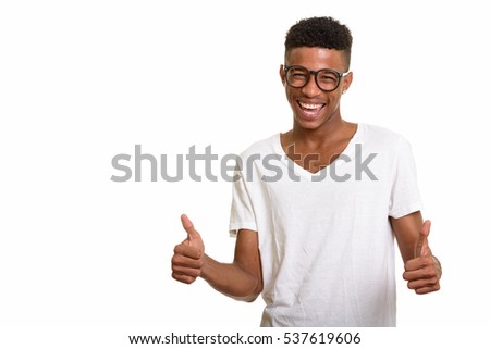 Young happy African man giving thumbs up