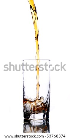 flow of cola into glass