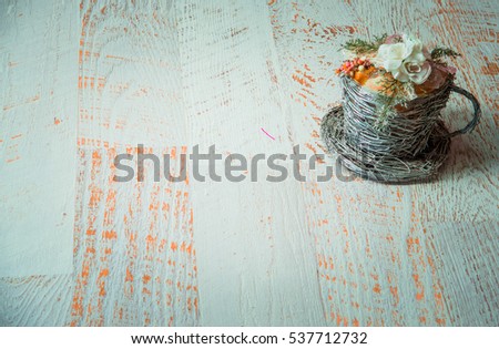 Decorative cup with oranges and flowers, Christmas decorations