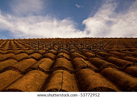 orange roof and the sky.