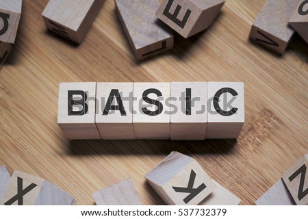 Basic Word Written In Wooden Cube