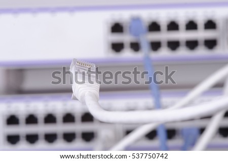 Photo of big server and wires.