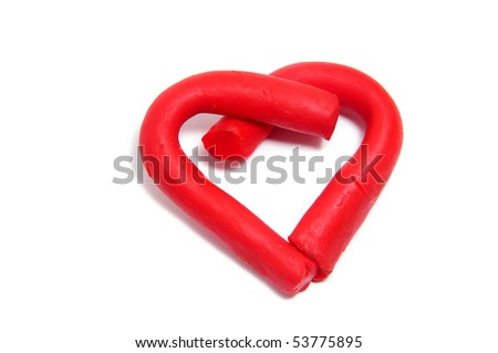 a plasticine heart on a white background