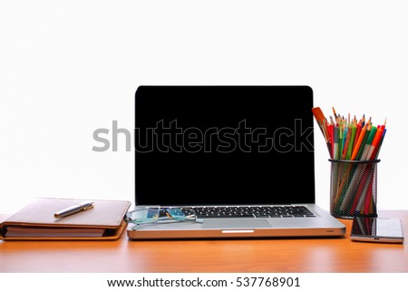 Working space. Laptop, notepad on wooden desk