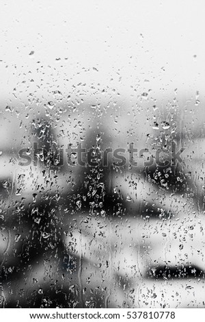 Texture Raindrops on  window glass for rain, black and white colors, photo, unusual background