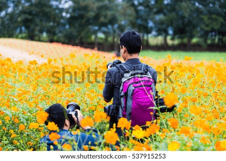 Photographer Man in nature background