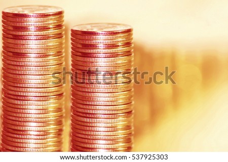 Coins stacked in bars. The concept of revenue growth