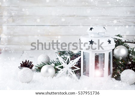 Christmas and New Year background with Christmas candle lantern and Christmas decorations